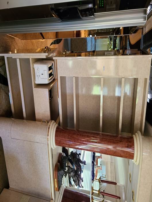 A desk with a computer and a keyboard

Description automatically generated