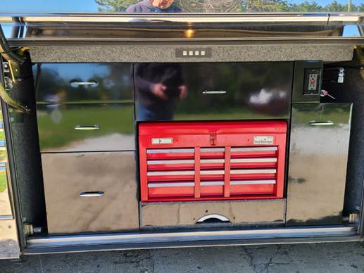 A display of a thermometer and a thermometer

Description automatically generated